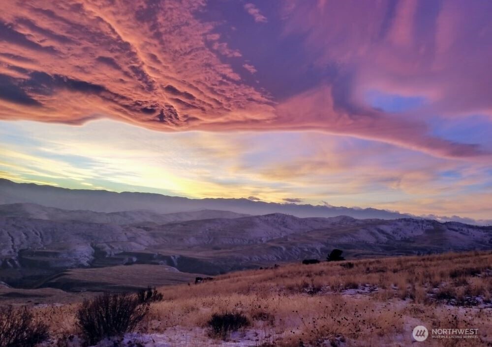 180 Harmony Heights Road Brewster, WA 98812 - Photo 10 of 13 a view of an outdoor space and mountain view