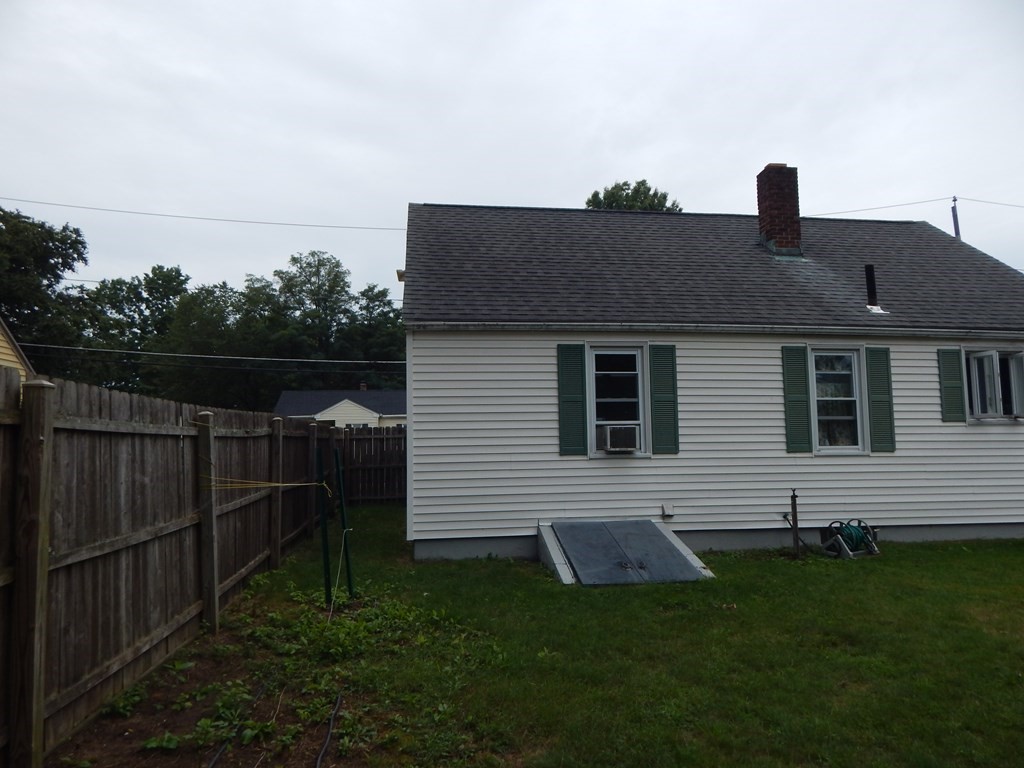 111 Elijah Street Springfield, MA 01109 - Photo 39 of 39 a front view of a house with a yard