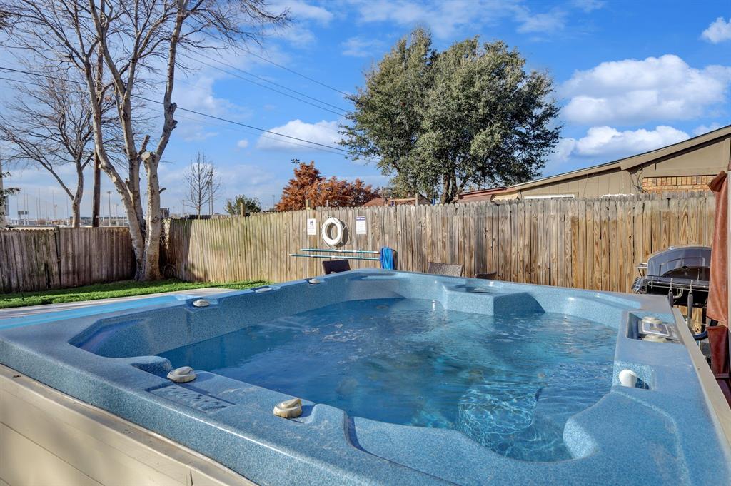 5112 Arbor Glen Road The Colony, TX 75056 - Photo 29 of 40 View of pool featuring a hot tub