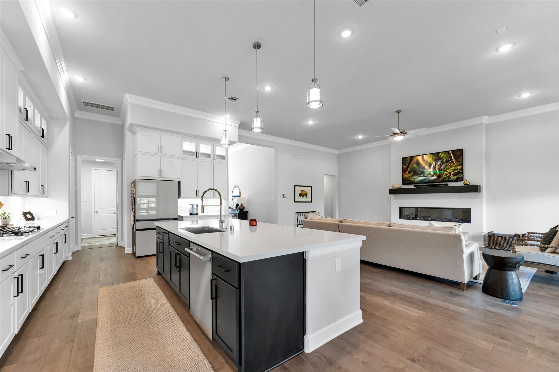 1027 Groveton Ridge Lane Pinehurst, TX 77362 - Photo 25 of 50 Another view of the open kitchen to the family room.