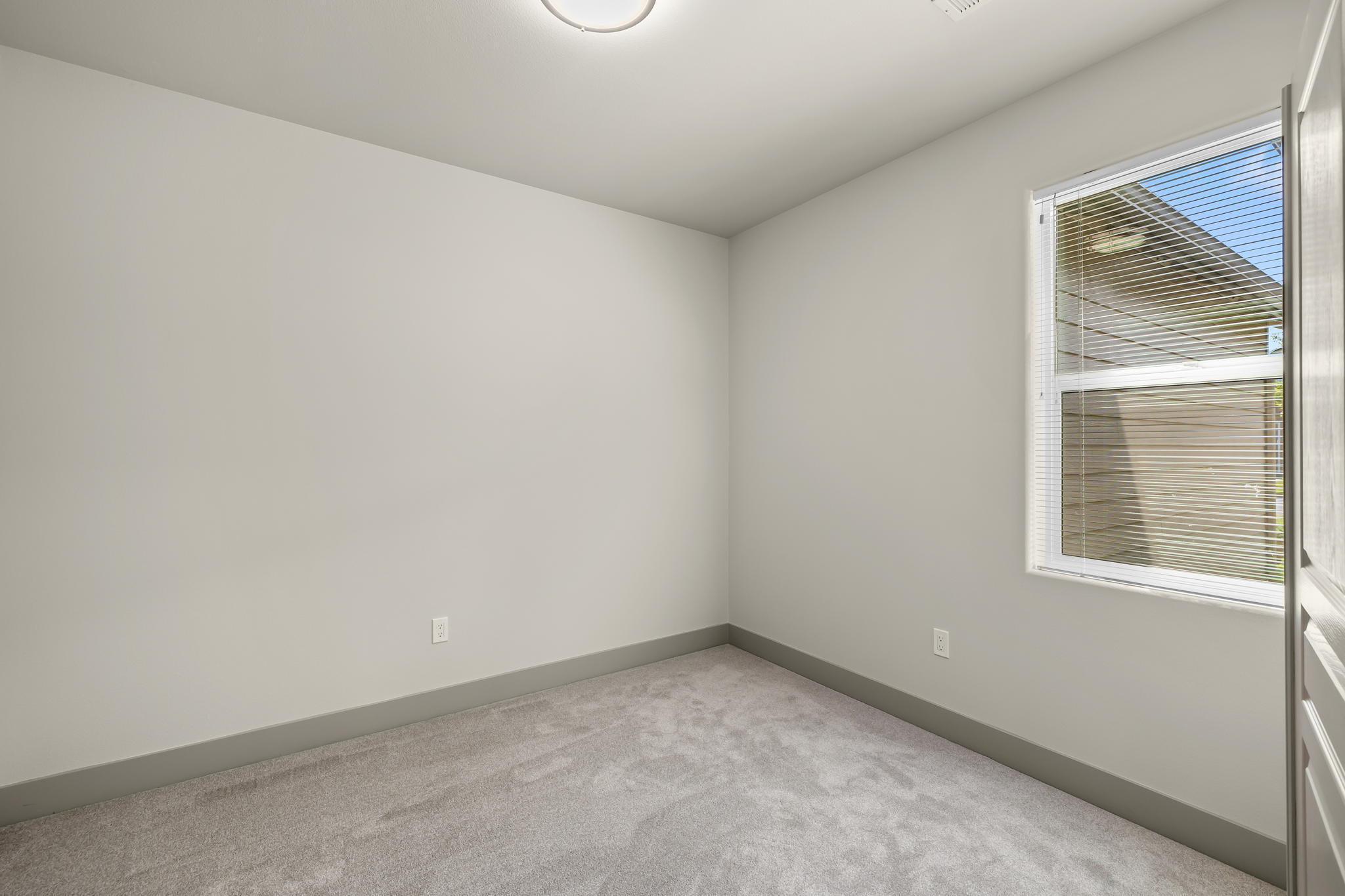3108 Yellow Ribbon Drive Bend, OR 97701 - Photo 12 of 36 a view of an empty room with a window