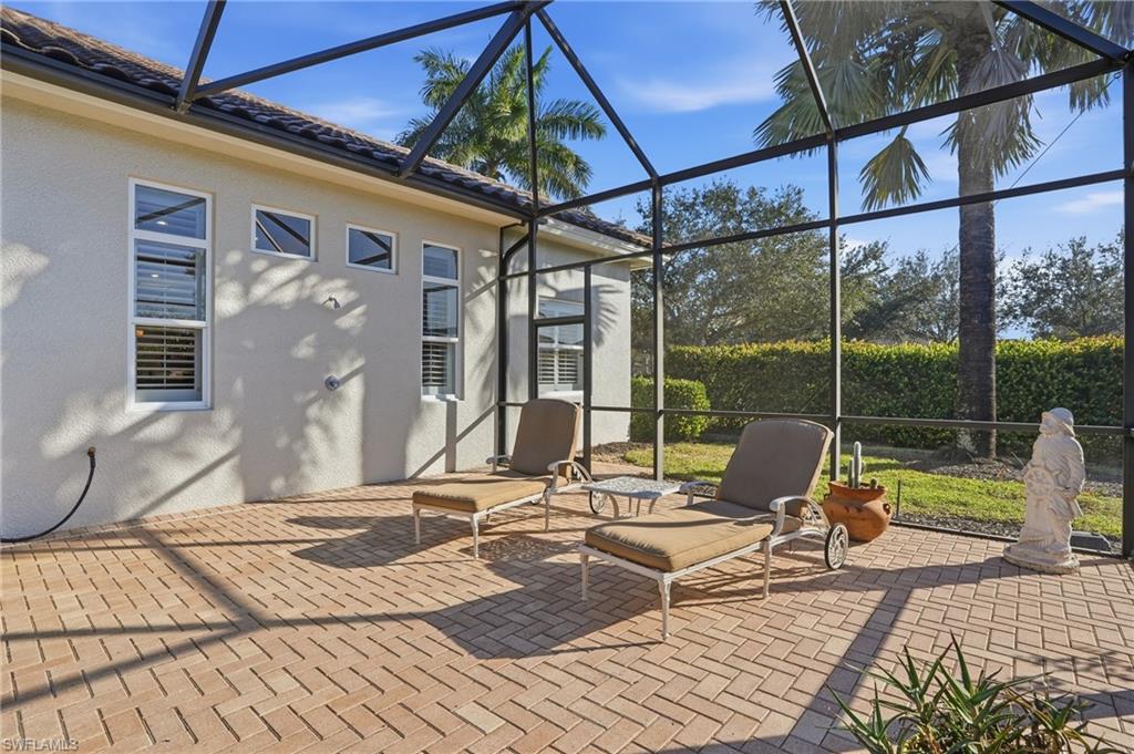 430 Saddlebrook Lane Naples, FL 34110 - Photo 30 of 37 a view of sitting area with furniture and wooden floor
