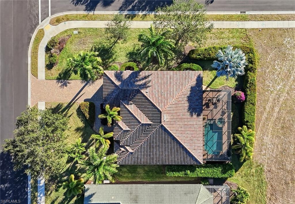 430 Saddlebrook Lane Naples, FL 34110 - Photo 37 of 37 an aerial view of a house with a garden and plants