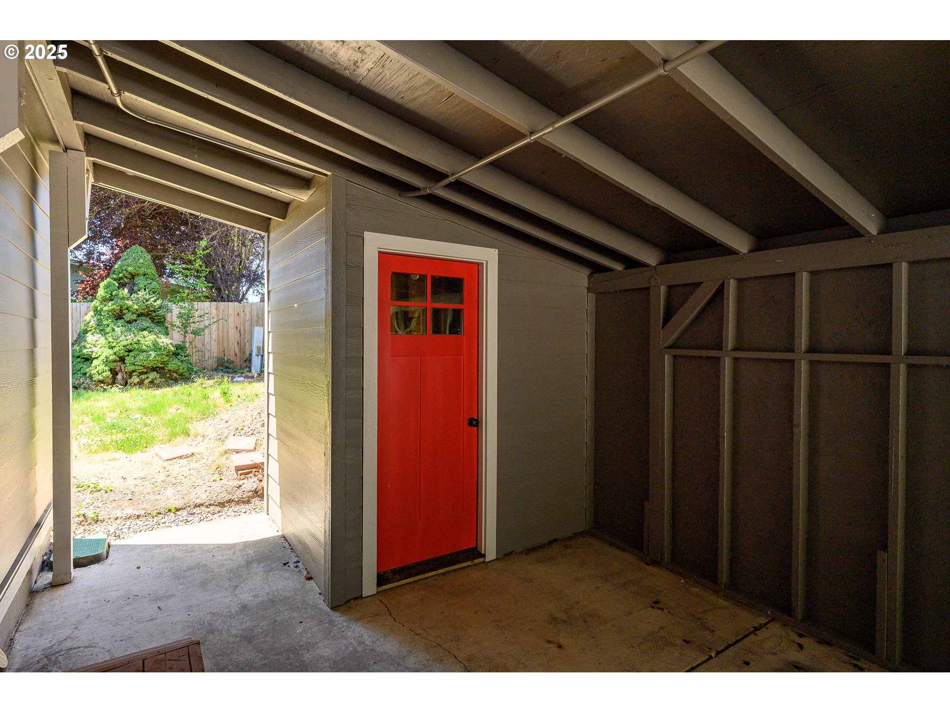13620 Southwest Beef Bend Road, Unit 38 Portland, OR 97224 - Photo 24 of 38 a view of an empty room and floor to ceiling window