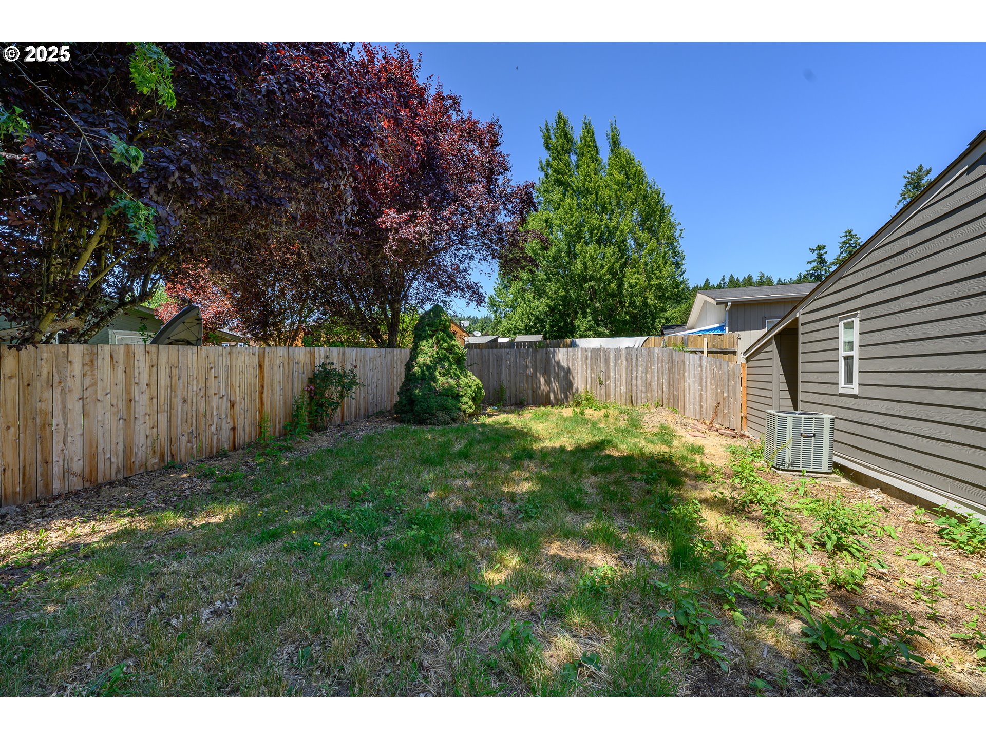 13620 Southwest Beef Bend Road, Unit 38 Portland, OR 97224 - Photo 27 of 38 a view of a backyard