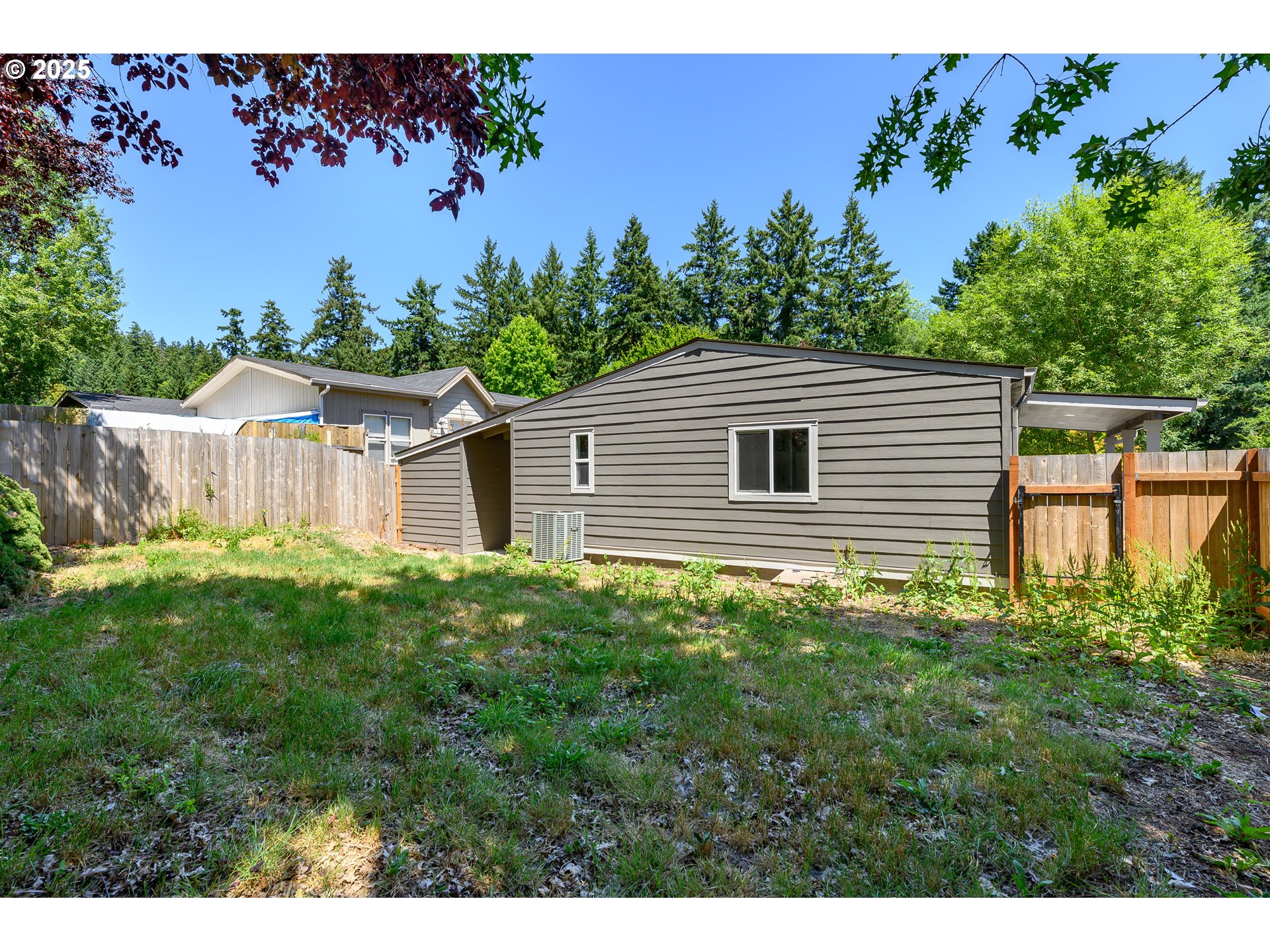 13620 Southwest Beef Bend Road, Unit 38 Portland, OR 97224 - Photo 28 of 38 a house view with a garden space