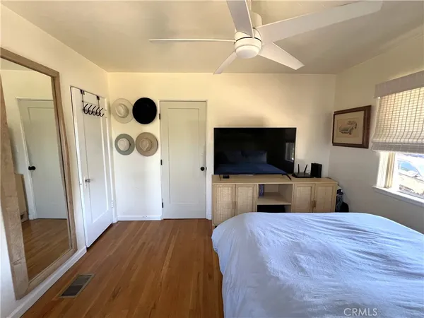 a kitchen with stainless steel appliances a stove and cabinets