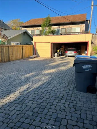 a view of a pathway with a patio
