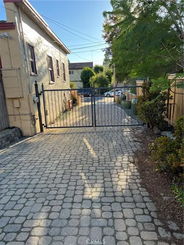 a kitchen with stainless steel appliances a stove a sink and cabinets