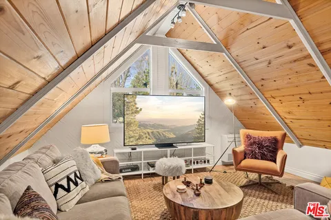 a room with table and wooden floor