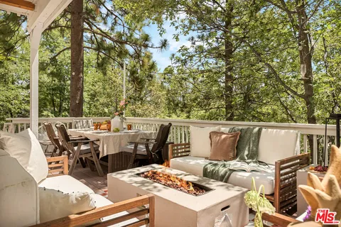 a view of balcony with furniture