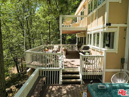 front view of a house with a tree