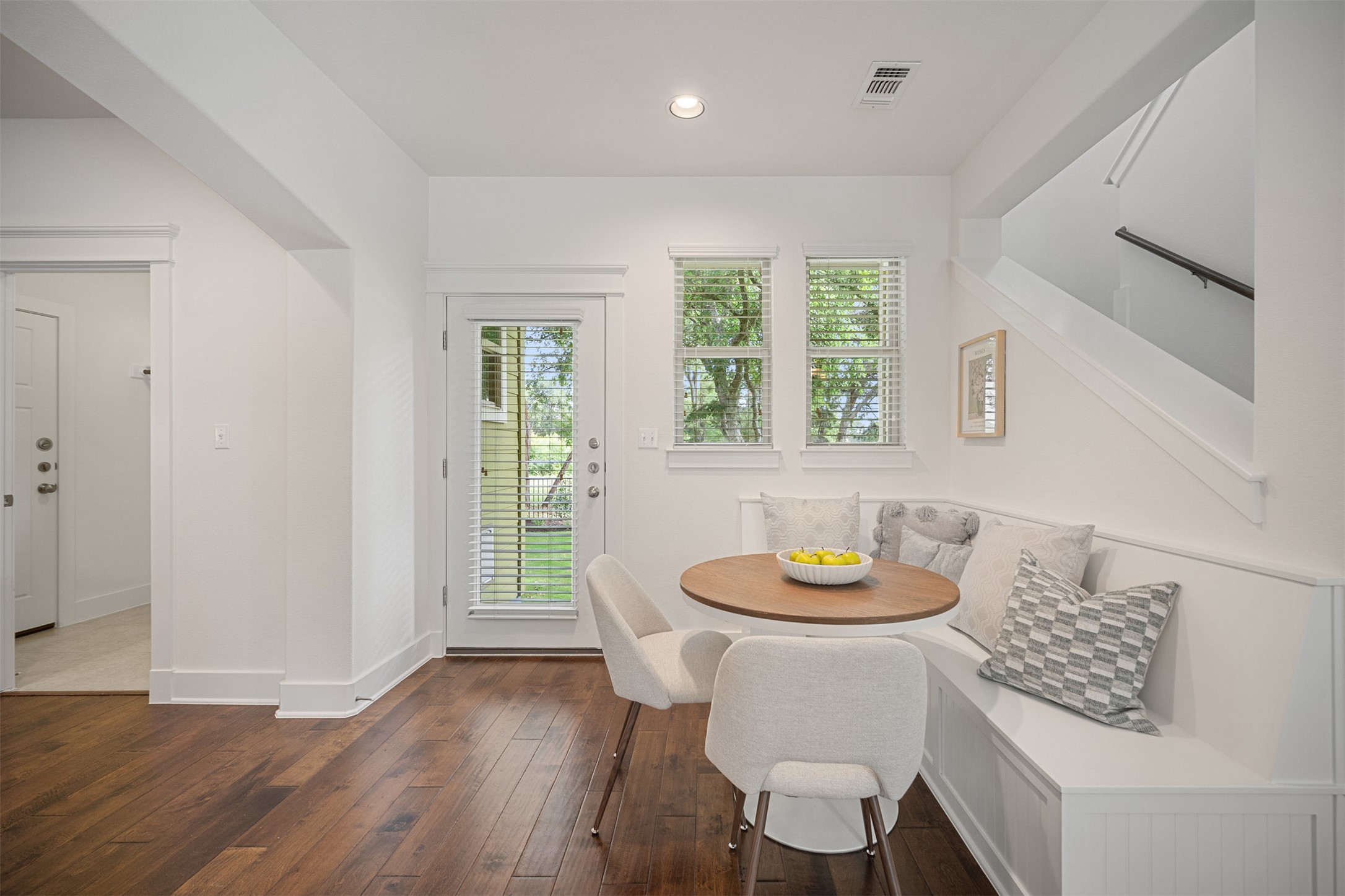 11013 Avery Station Loop, Unit 31 Austin, TX 78717 - Photo 21 of 38 With its charming built-in bench seat, the dining area offers a unique spot for enjoying meals while soaking in the view of the peaceful surroundings