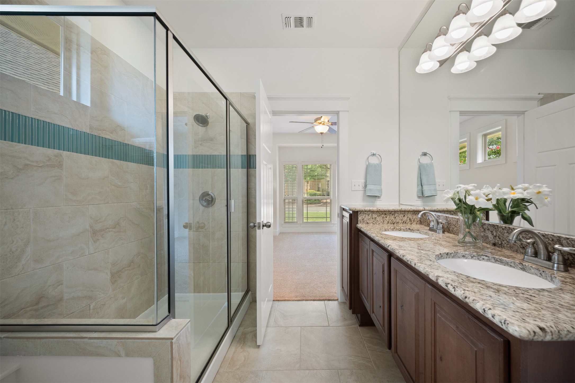 11013 Avery Station Loop, Unit 31 Austin, TX 78717 - Photo 23 of 38 The ensuite bath mirrors that sense of seclusion, spacious enough for you to take your time unwinding