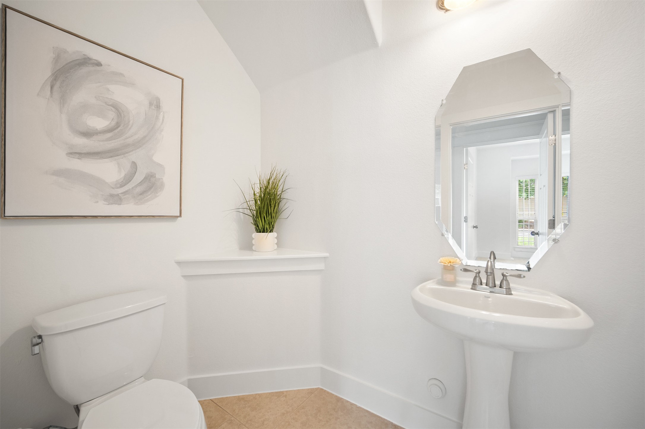 11013 Avery Station Loop, Unit 31 Austin, TX 78717 - Photo 26 of 38 Half bathroom on the main floor