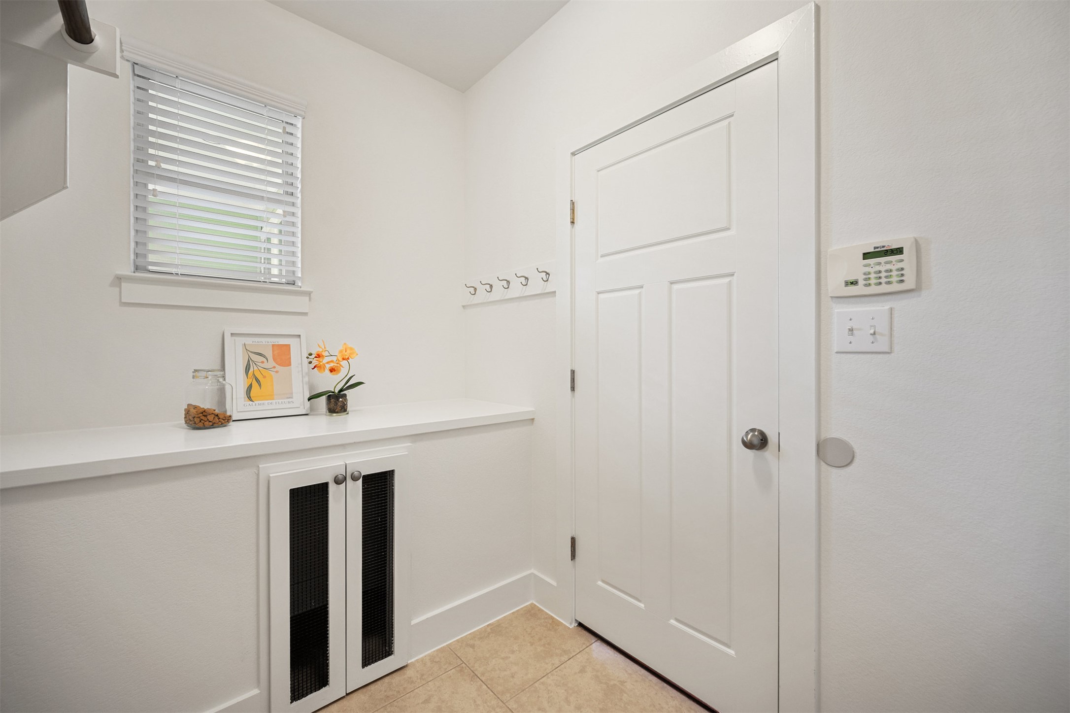 11013 Avery Station Loop, Unit 31 Austin, TX 78717 - Photo 30 of 38 The laundry room featuring the Pet Suite, with direct access to outside, conveniently located with direct access to the one-car garage, makes chore time easier by keeping everything within reach