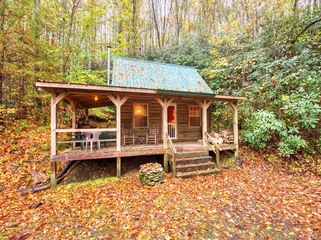 784 Flat Branch Road Waynesville, NC 28785 - Photo 1 of 25 front view of a house with a yard