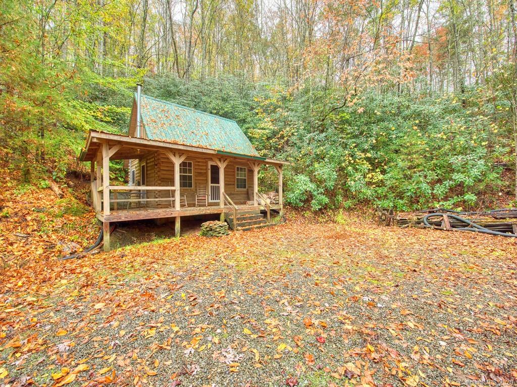 784 Flat Branch Road Waynesville, NC 28785 - Photo 2 of 25 a view of a house with a yard