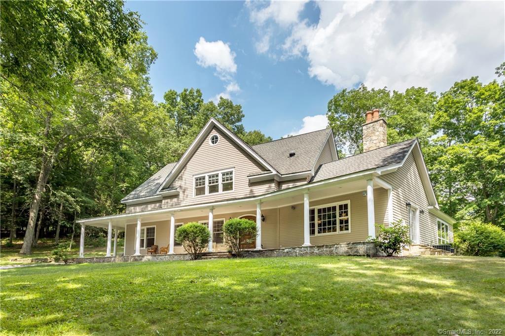 42 Sentry Hill Road Roxbury, CT 06783 - Photo 1 of 1 a front view of a house with a garden