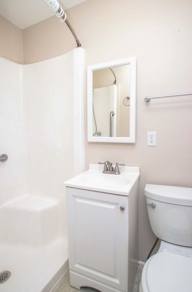 590 Weeping Elm Road Mount Juliet, TN 37122 - Photo 11 of 20 a bathroom with a toilet a sink and a mirror