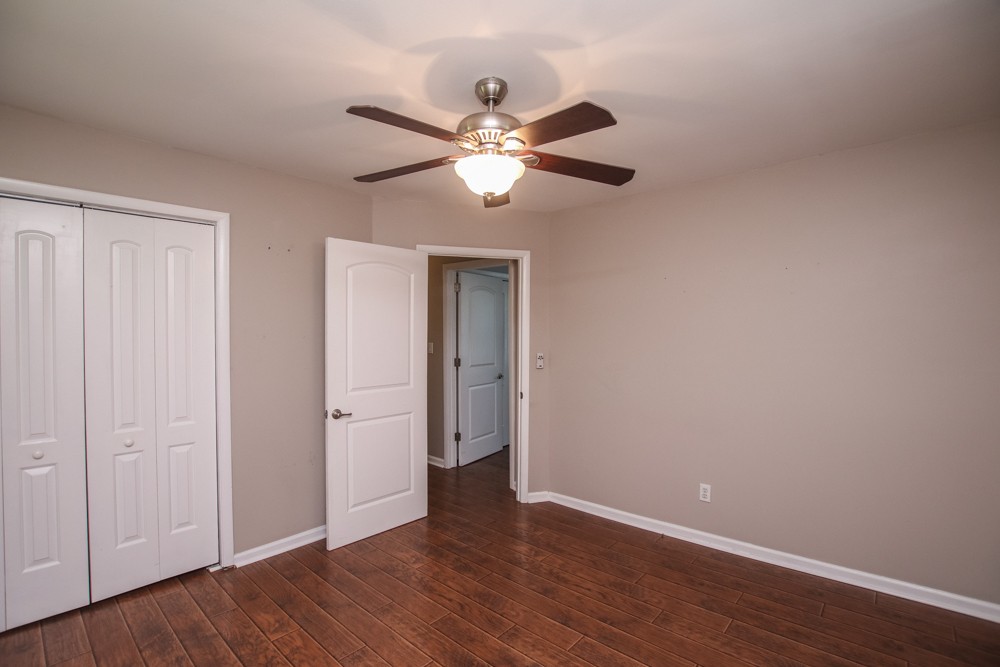 590 Weeping Elm Road Mount Juliet, TN 37122 - Photo 13 of 20 a view of an empty room with wooden floor