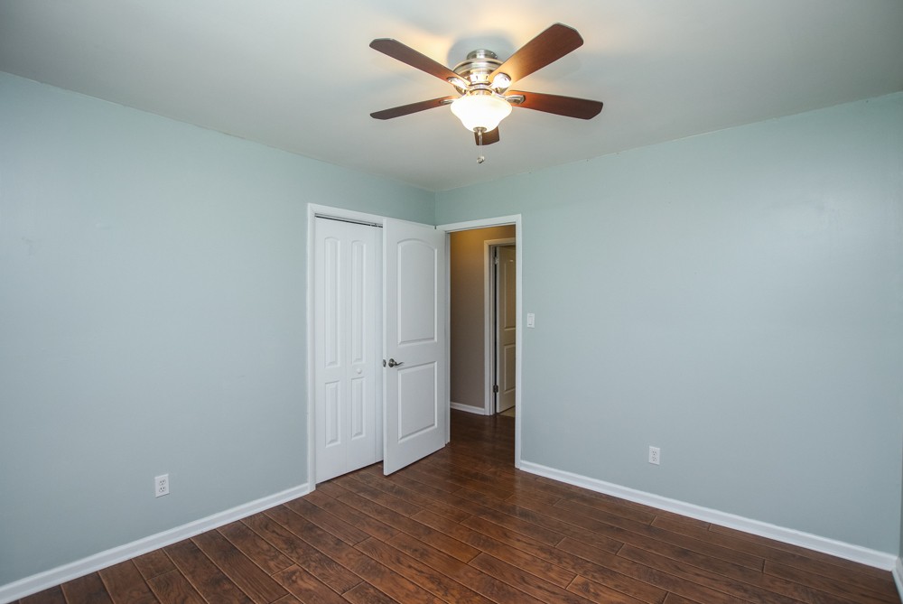 590 Weeping Elm Road Mount Juliet, TN 37122 - Photo 16 of 20 a view of an empty room with wooden floor