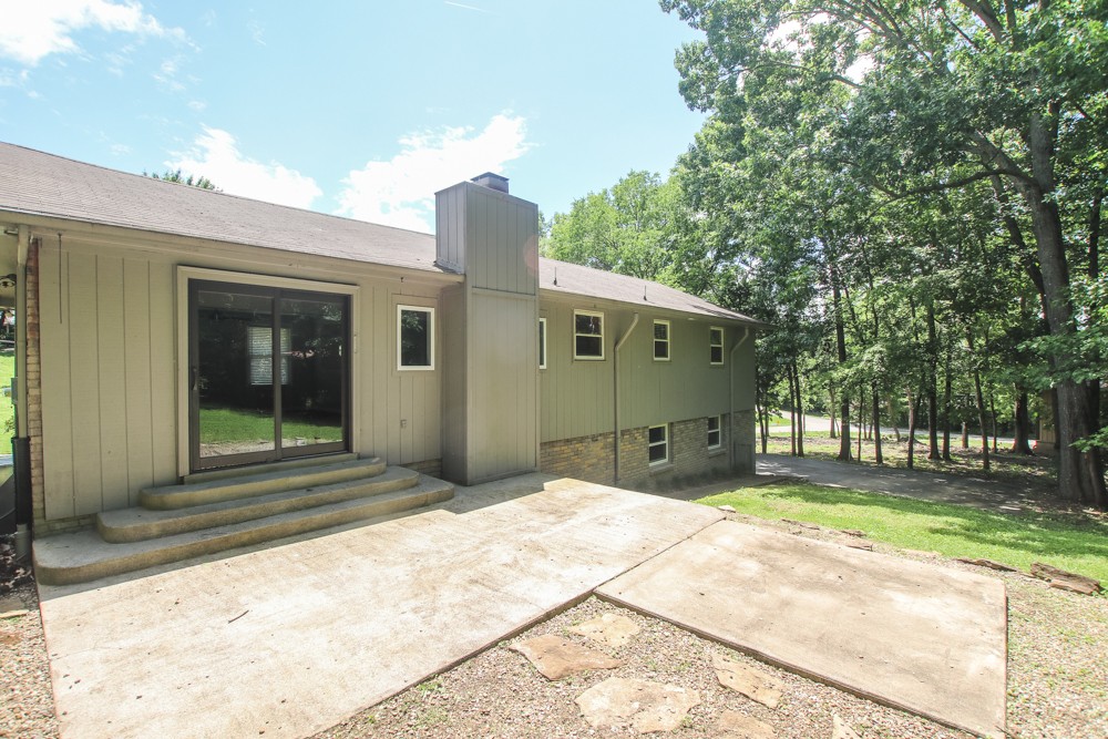 590 Weeping Elm Road Mount Juliet, TN 37122 - Photo 19 of 20 a front view of a house with a yard and garage