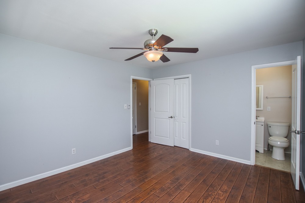 590 Weeping Elm Road Mount Juliet, TN 37122 - Photo 10 of 20 a view of a room with wooden floor and a ceiling fan