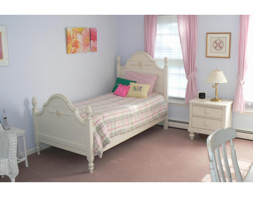 54 Ridge Avenue Newton, MA 02459 - Photo 15 of 20 a bedroom with a bed and a cabinets
