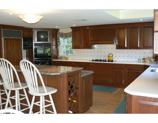 54 Ridge Avenue Newton, MA 02459 - Photo 8 of 20 a kitchen with a sink and cabinets