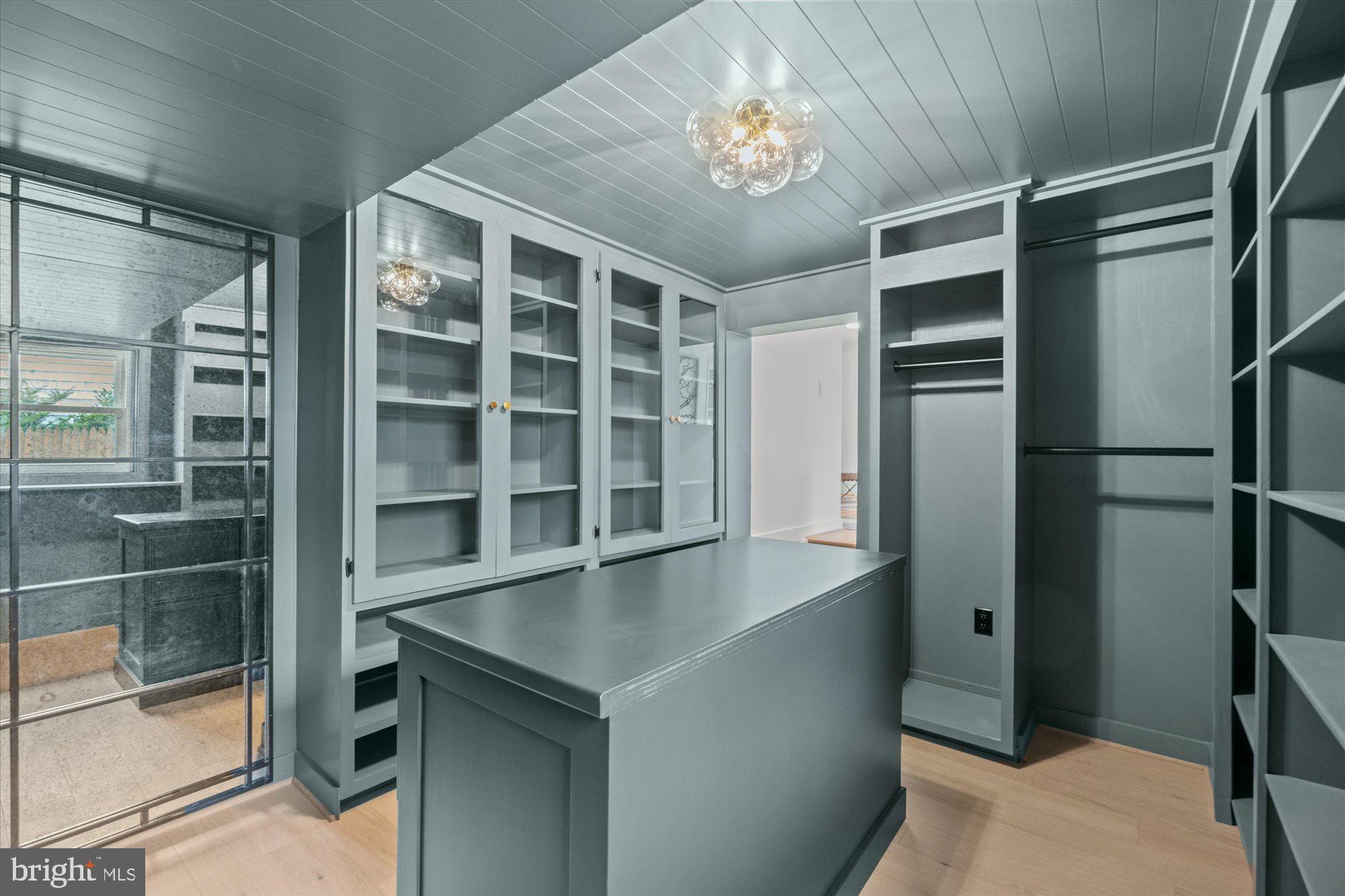 9911 Holmhurst Road Bethesda, MD 20817 - Photo 26 of 46 Primary walk-in closet with vintage mirror