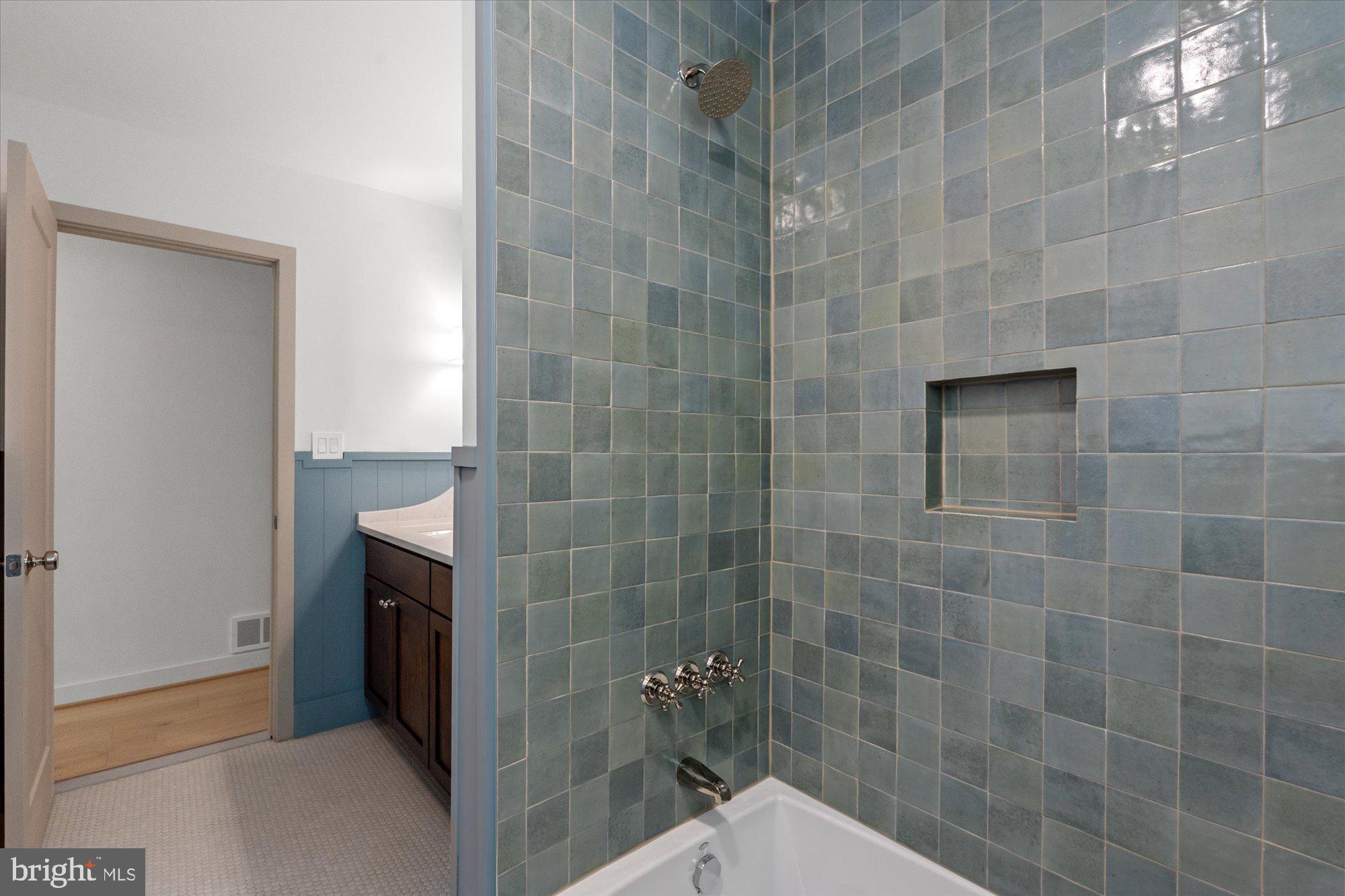 9911 Holmhurst Road Bethesda, MD 20817 - Photo 32 of 46 Tub and shower in upper-level bathroom