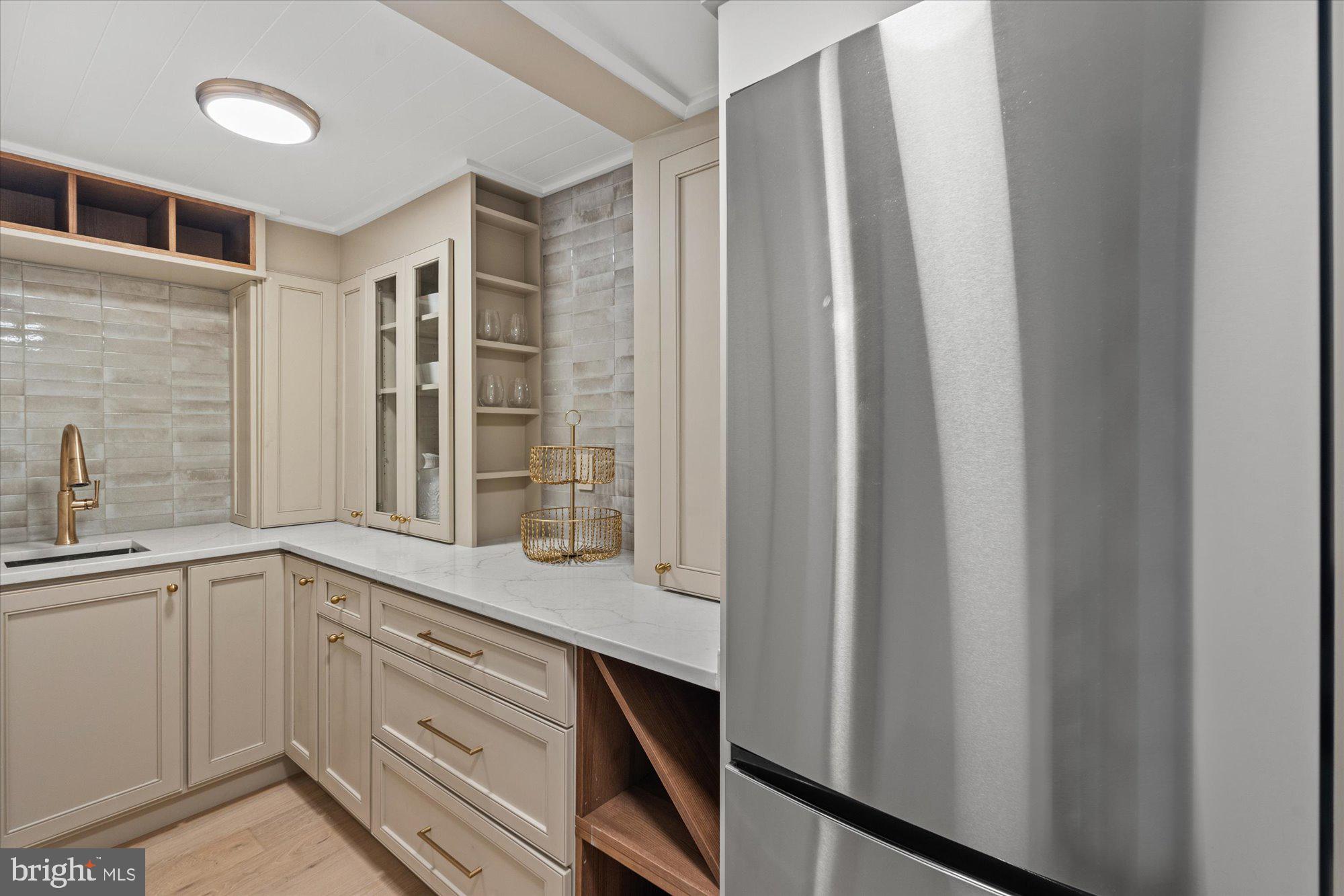 9911 Holmhurst Road Bethesda, MD 20817 - Photo 35 of 46 Kitchenette off of secondary family room