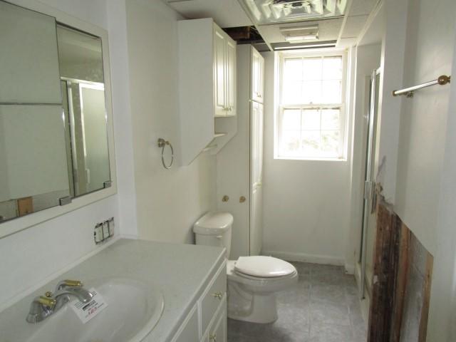 82 Megan Road Hyannis, MA 02601 - Photo 11 of 16 a bathroom with a sink toilet and shower