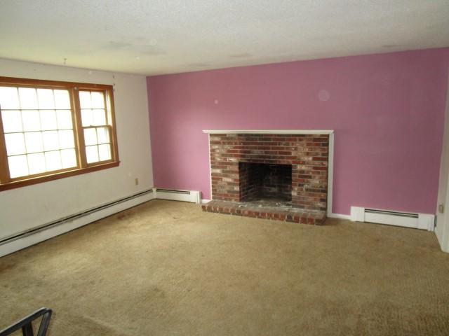 82 Megan Road Hyannis, MA 02601 - Photo 2 of 16 an empty room with windows