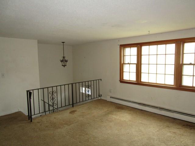 82 Megan Road Hyannis, MA 02601 - Photo 3 of 16 a view of an empty room with a window