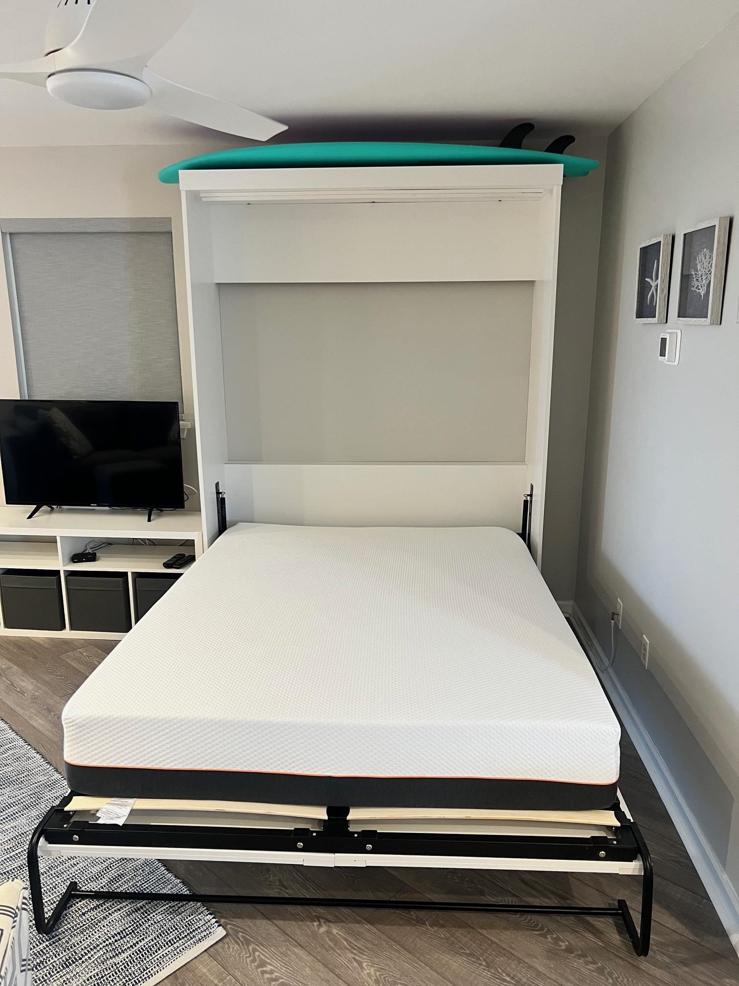 177 80th Street, Unit 304 Avalon, NJ 08202 - Photo 21 of 31 a bedroom with a bed and a tv