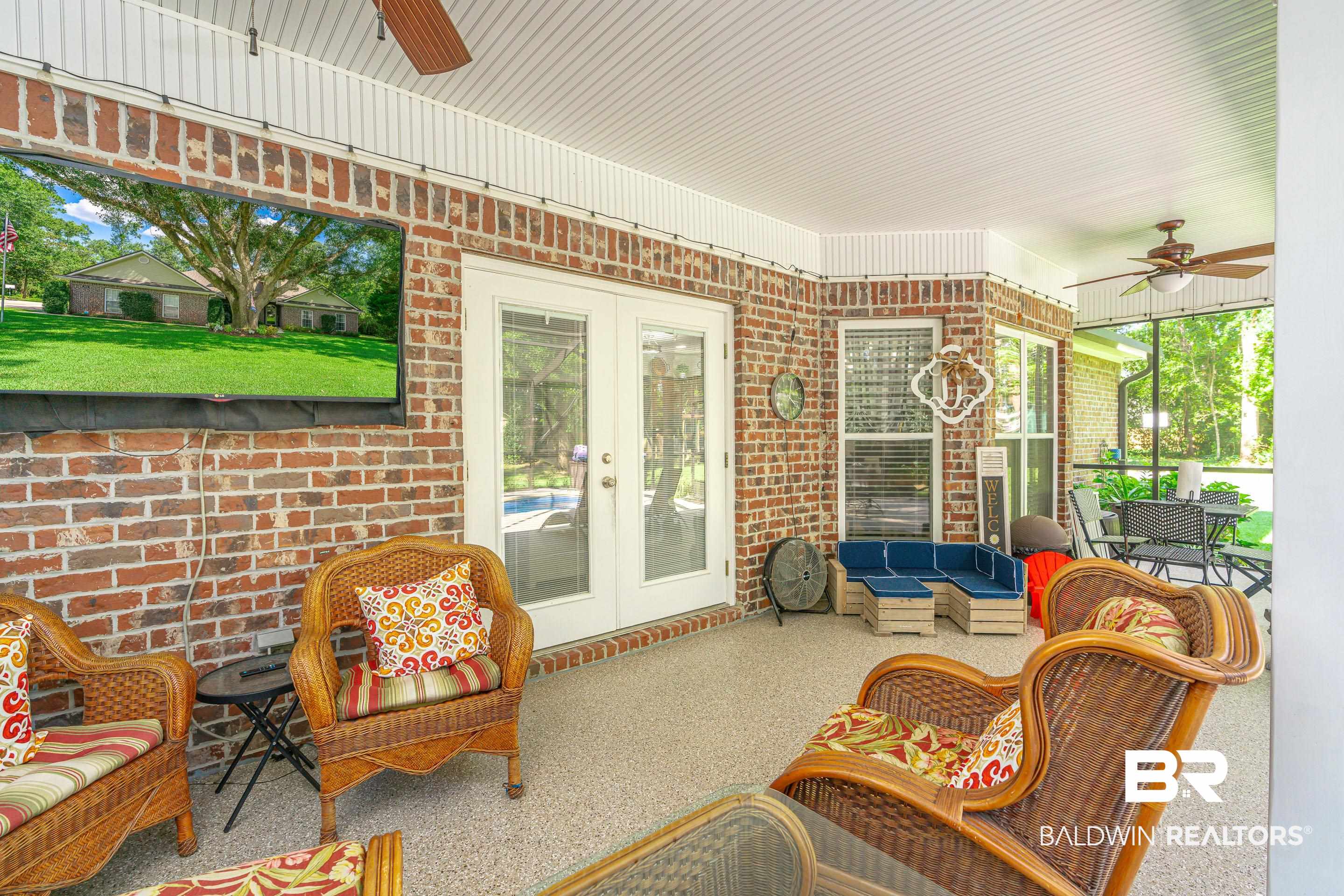 302 Bristol Way Foley, AL 36535 - Photo 33 of 51 View of patio featuring outdoor lounge area and ceiling fan