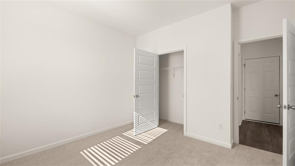 73 White Spruce Way Newnan, GA 30265 - Photo 17 of 47 a view of an empty room