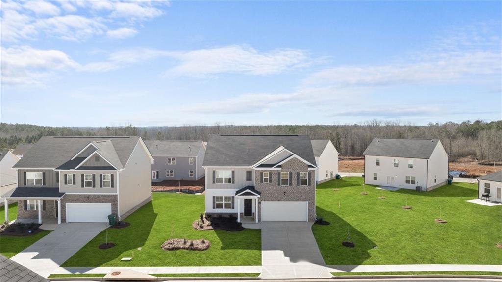 73 White Spruce Way Newnan, GA 30265 - Photo 2 of 47 a view of a house with city view