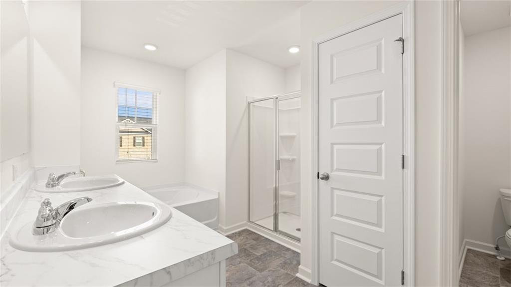 73 White Spruce Way Newnan, GA 30265 - Photo 24 of 47 a bathroom with a sink and a mirror