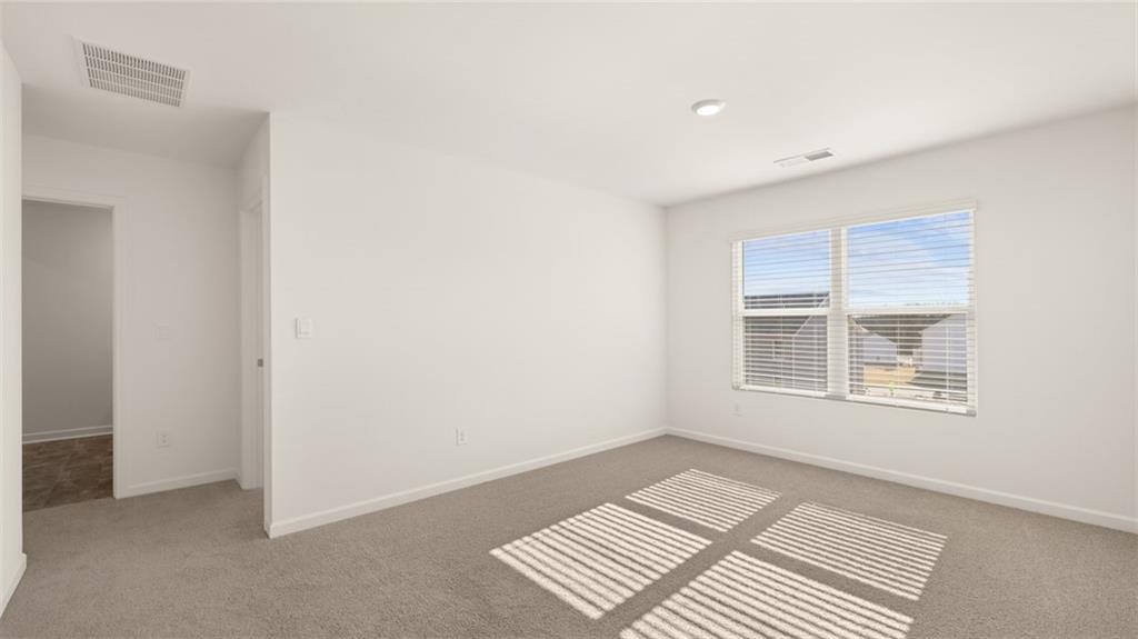 73 White Spruce Way Newnan, GA 30265 - Photo 33 of 47 a view of an empty room with a window