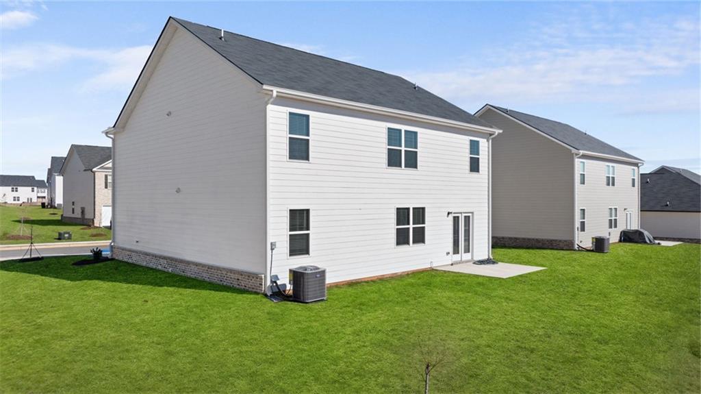 73 White Spruce Way Newnan, GA 30265 - Photo 41 of 47 a view of a house with backyard