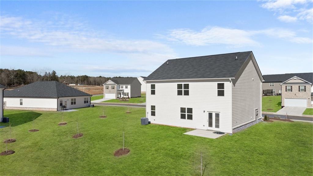 73 White Spruce Way Newnan, GA 30265 - Photo 43 of 47 a view of a house with backyard