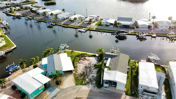 an aerial view of a house with outdoor space