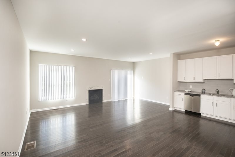 96 Arlene Court Morris Plains, NJ 07950 - Photo 16 of 24 a view of a kitchen with a sink and wooden floor