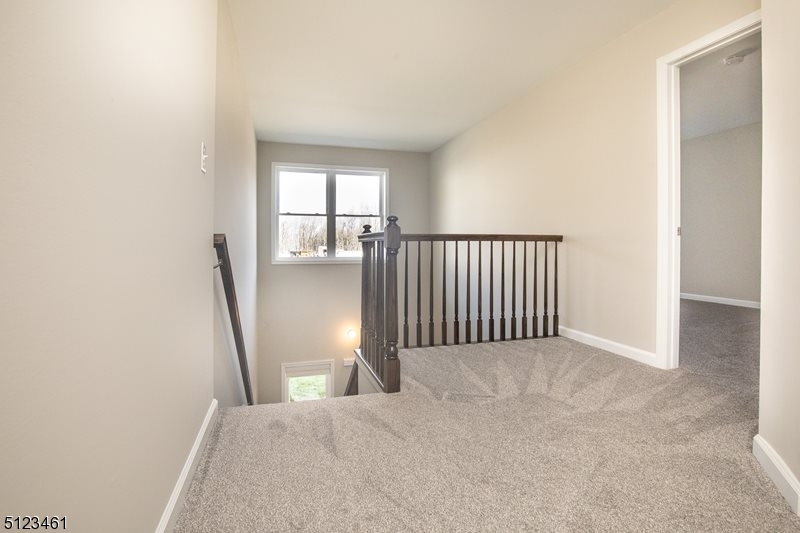 96 Arlene Court Morris Plains, NJ 07950 - Photo 17 of 24 a view of a hallway with a window