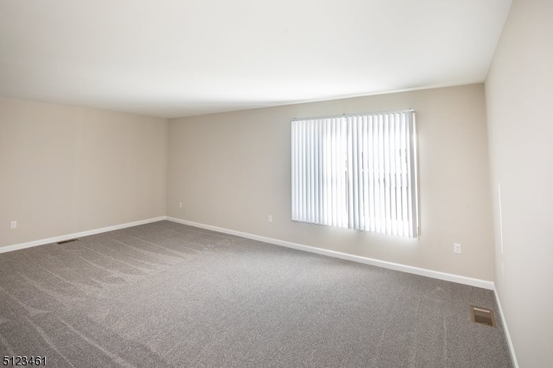96 Arlene Court Morris Plains, NJ 07950 - Photo 20 of 24 an empty room with a window