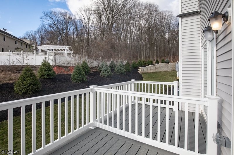 96 Arlene Court Morris Plains, NJ 07950 - Photo 23 of 24 a view of a wooden bench and trees