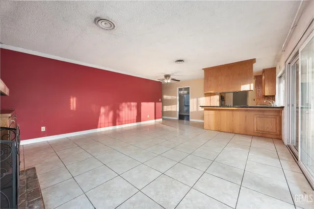 a view of a kitchen with a sink and an oven